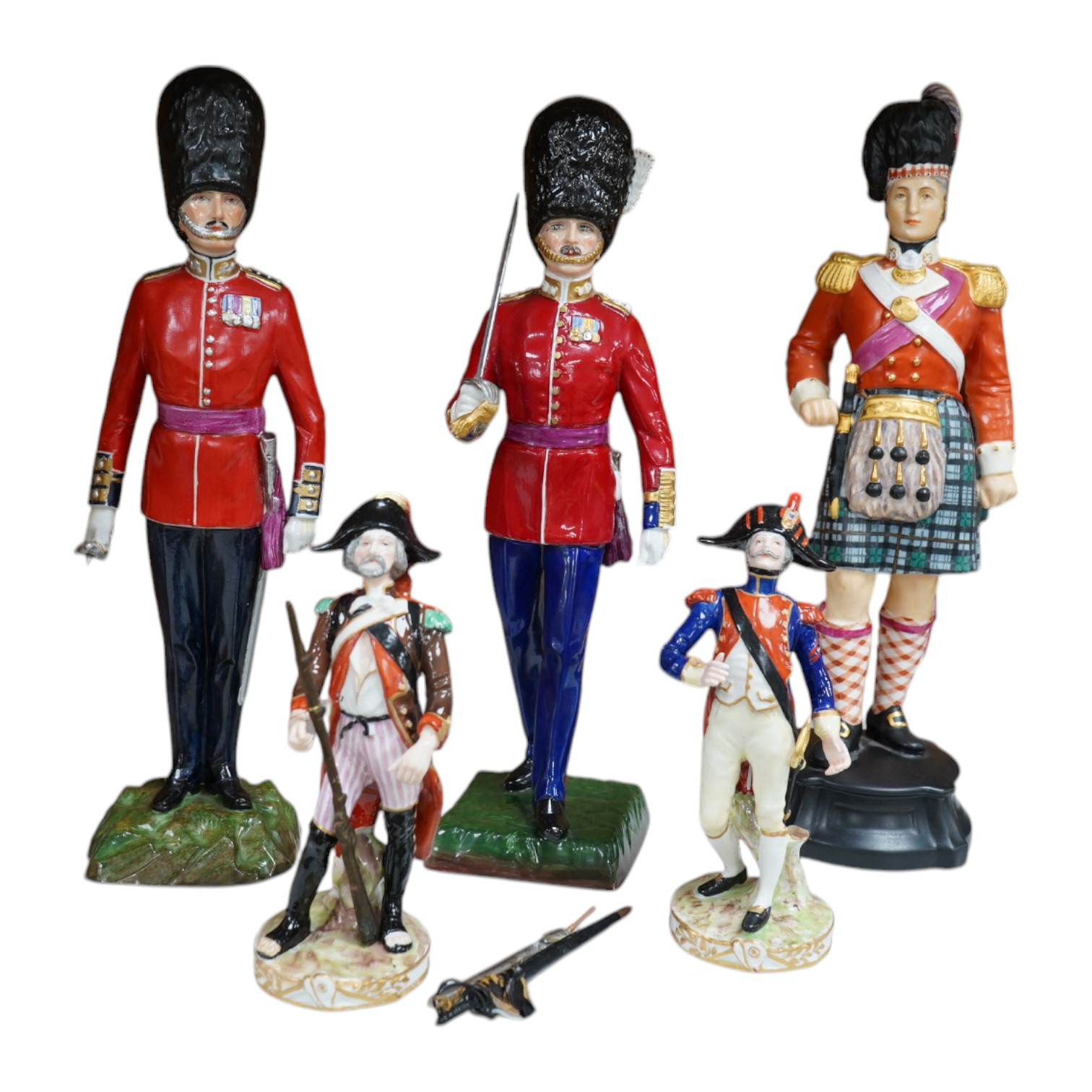 A pair of Sevres style Napoleonic figures and three others including Worcester, tallest 30cm. Condition - fair to good